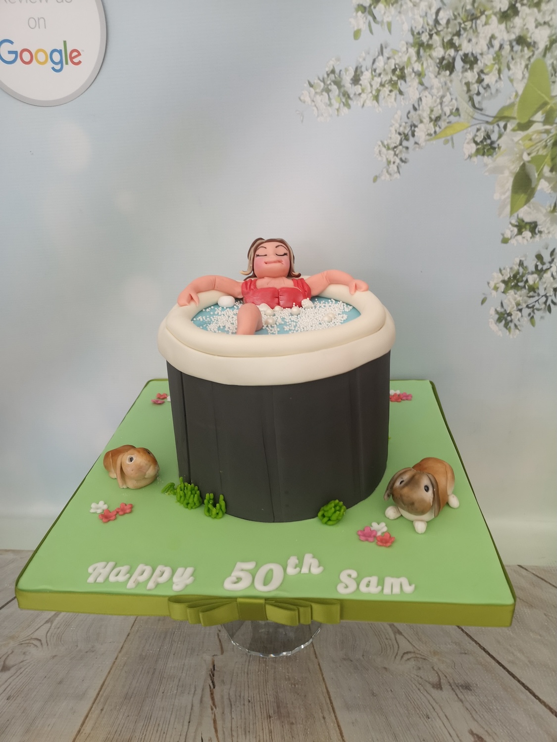 fondant lady in hot tub birthday cake