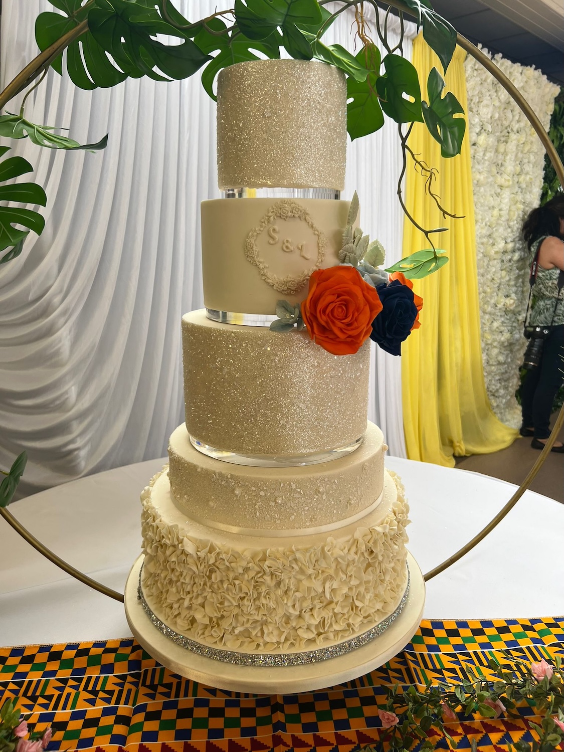 ivory gold sparkle and ruffle wedding cake