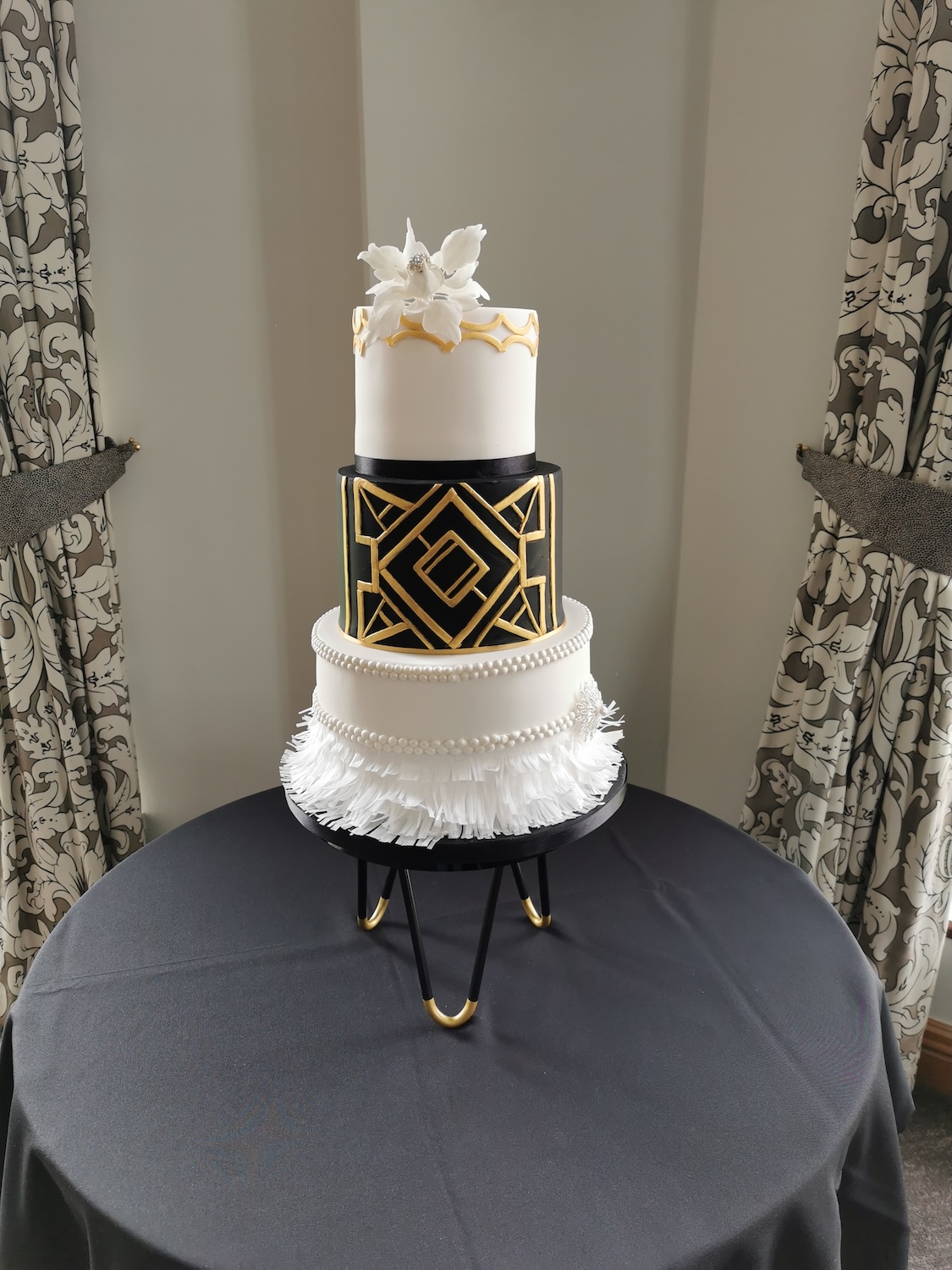 multi tier black gold art deco 20s style wedding cake